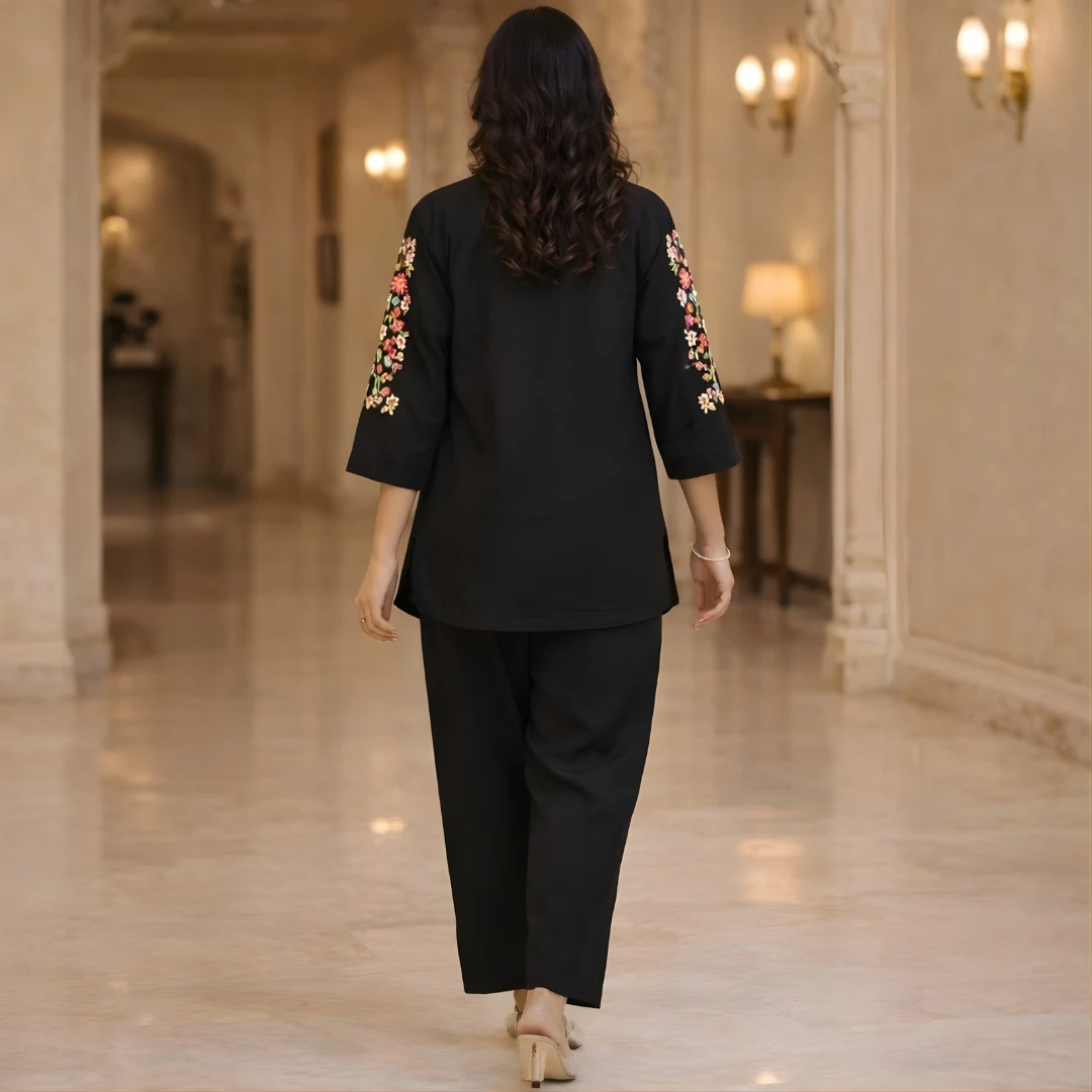 Back view of black embroidered co-ord set with floral sleeve detailing