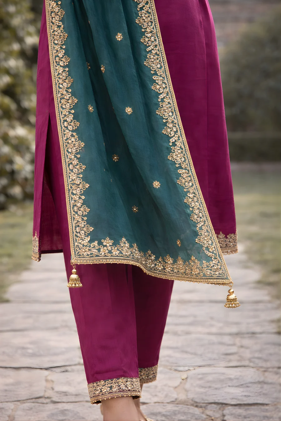 Teal green dupatta with gold embroidery and tassels detail