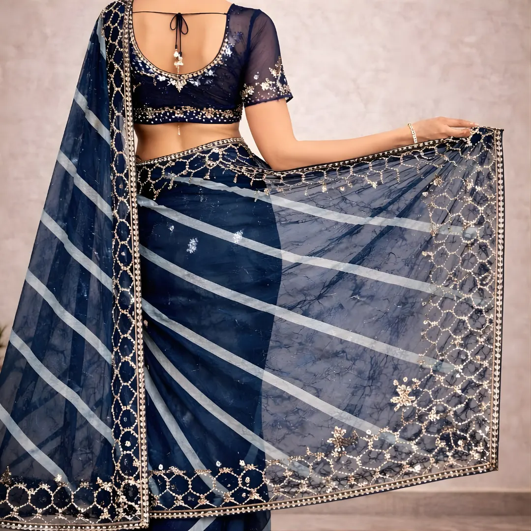Navy blue saree pallu close up with silver embroidery border