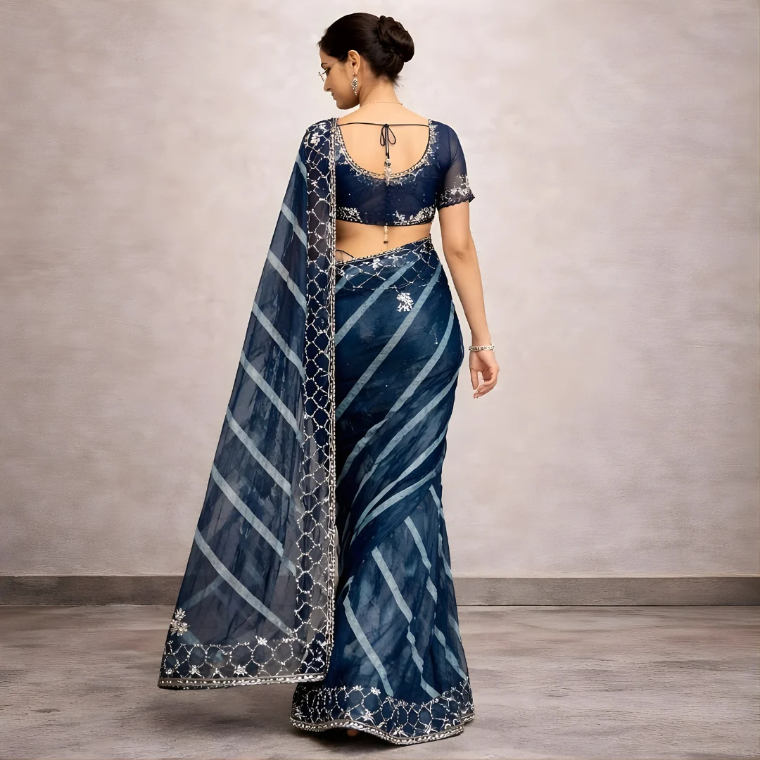 Navy blue saree back view with embroidered border and pallu