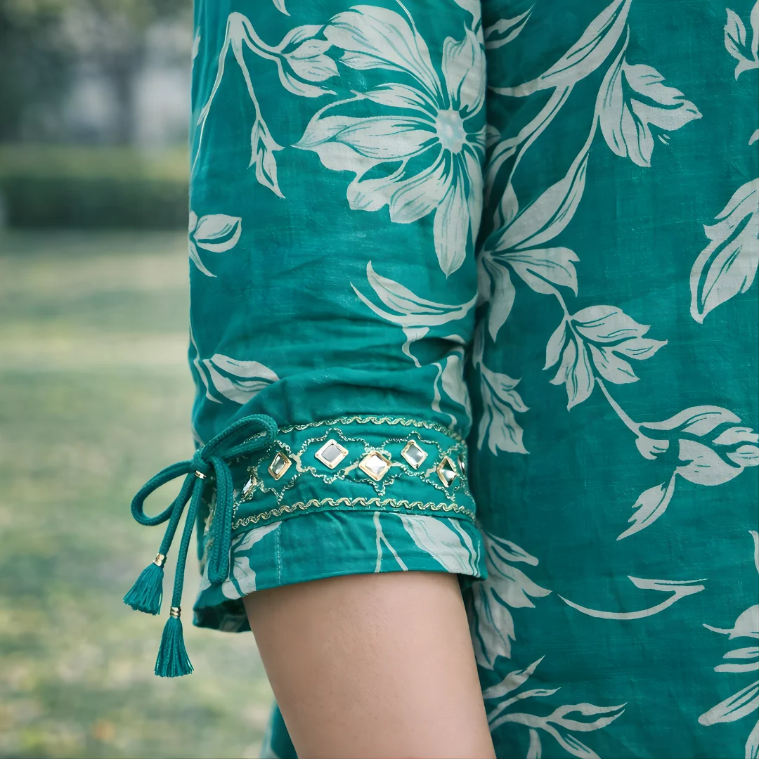 Teal floral kurta sleeve with mirror work tie-up detail