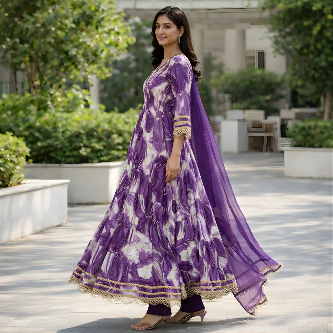 Side view of purple frock style salwar suit with dupatta