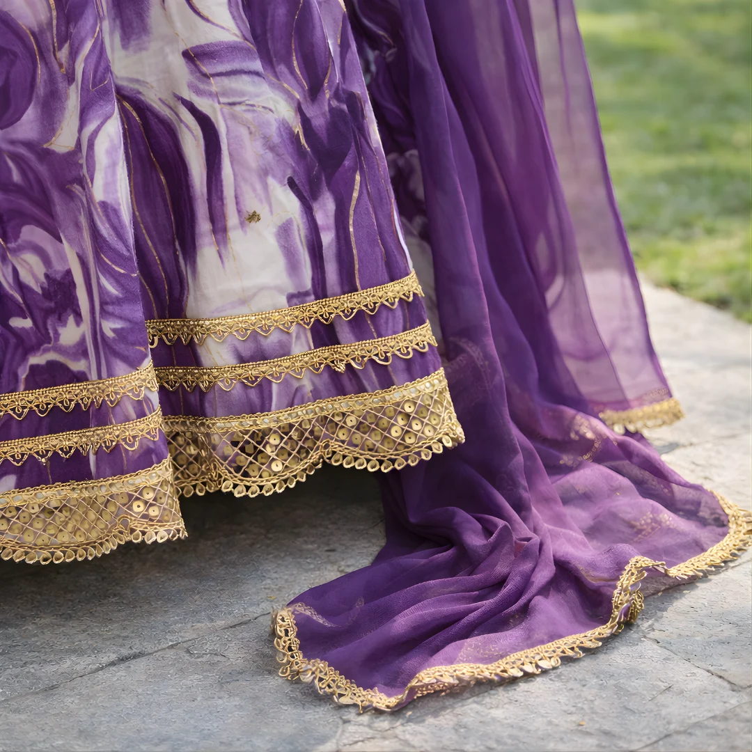 Purple dupatta with lace border and frock hem detail