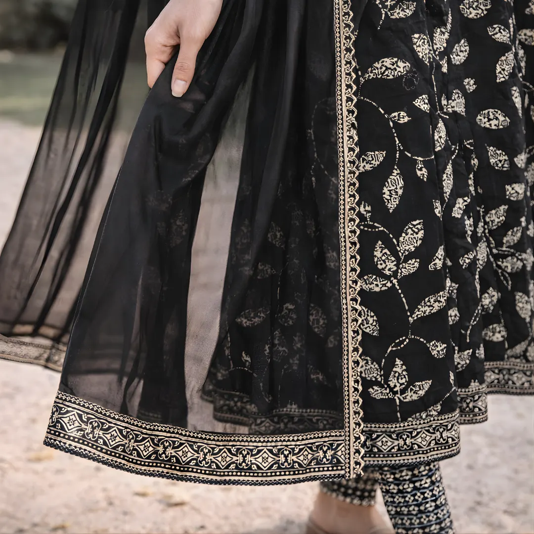 Black dupatta with embroidered border paired with frock suit