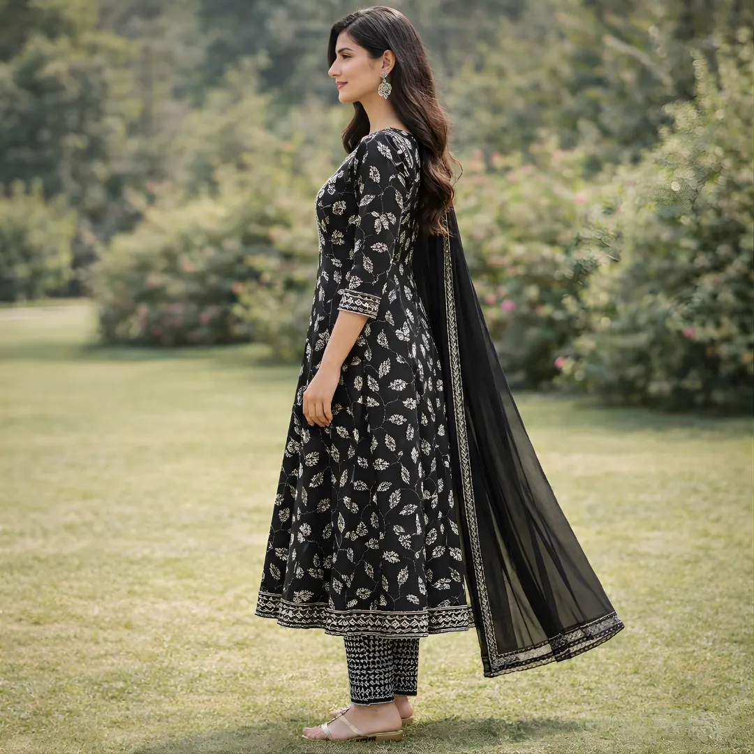 Side view of black printed frock pattern salwar suit with dupatta